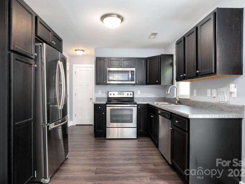 207 Stoney Point Way, Candler, NC 28715.  MLS# CAR4260849, YatesRealty ID 17441. Ample Kitchen Storage