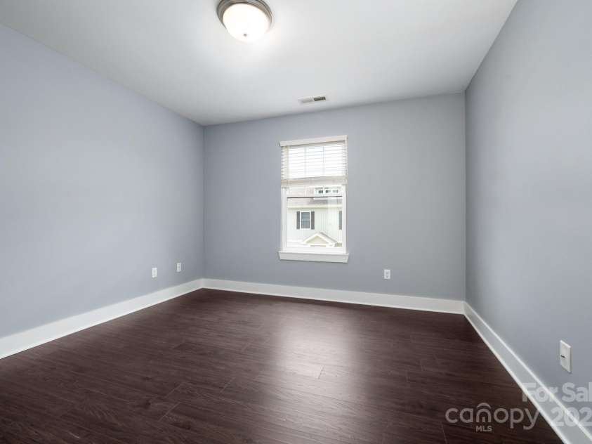 207 Stoney Point Way, Candler, NC 28715.  MLS# CAR4260849, YatesRealty ID 17441. Guest Bedroom Two with Vinyl Plank Flooring