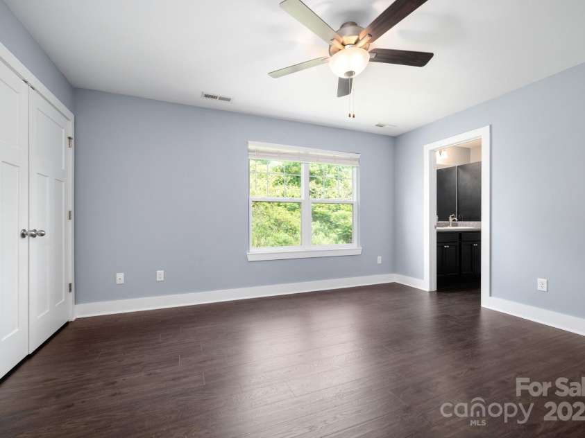 207 Stoney Point Way, Candler, NC 28715.  MLS# CAR4260849, YatesRealty ID 17441. Primary Suite with Attached Bathroom