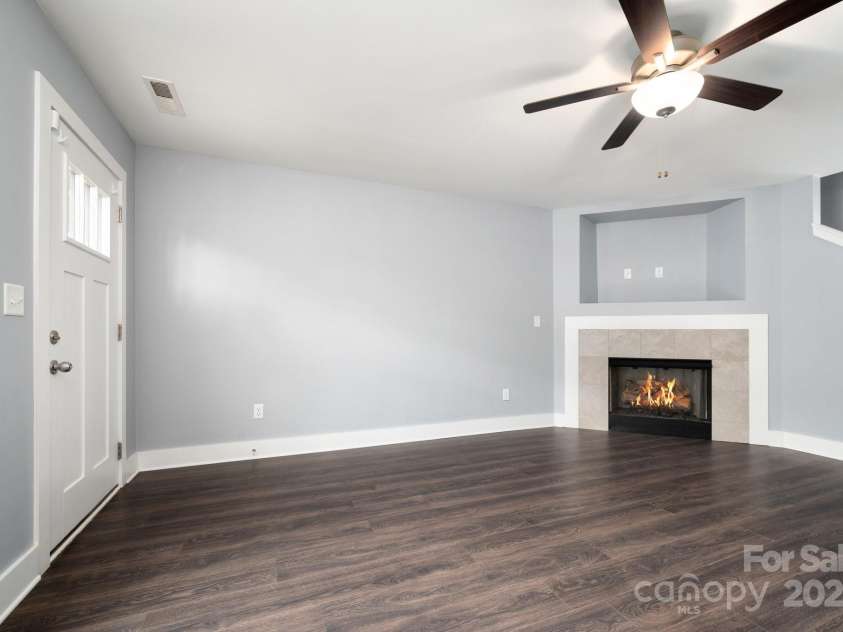 207 Stoney Point Way, Candler, NC 28715.  MLS# CAR4260849, YatesRealty ID 17441. Step into a Lovely Living Space