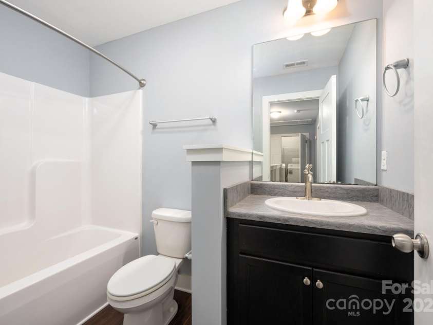207 Stoney Point Way, Candler, NC 28715.  MLS# CAR4260849, YatesRealty ID 17441. Upper-Level Guest Bathroom