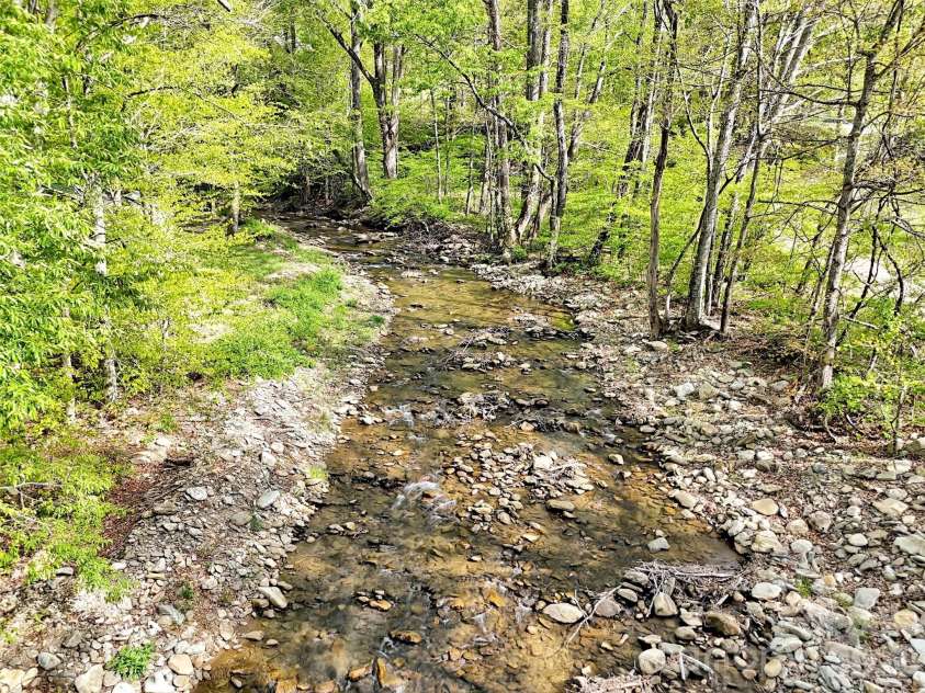 455 Chinquapin Road, Canton, NC 28716.  MLS# CAR4375378, YatesRealty ID 17441. Creek on Property