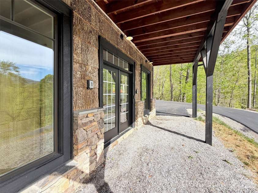 455 Chinquapin Road, Canton, NC 28716.  MLS# CAR4375378, YatesRealty ID 17441. Lower level entrance