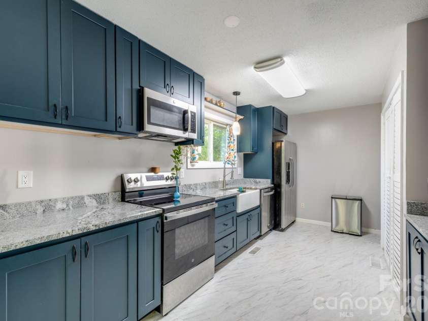 823 Fanning Bridge Road, Fletcher, NC 28732.  MLS# CAR4376125, YatesRealty ID 17443. 