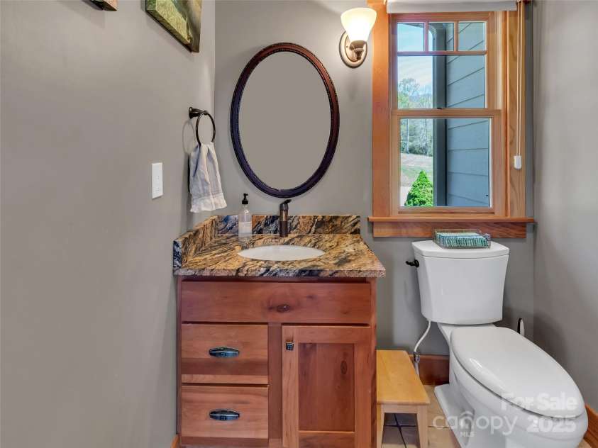 12 Rolling Meadow Lane, Clyde, NC 28721.  MLS# CAR4132706, YatesRealty ID 17445. Half bath on main