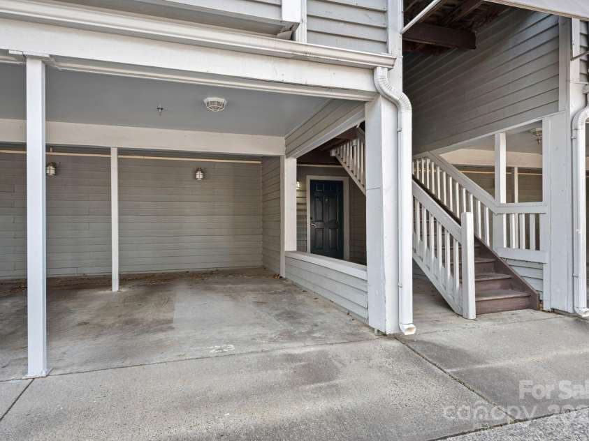 513 Graham Street, Charlotte, NC 28202.  MLS# CAR4255342, YatesRealty ID 17449. Covered Parking Spot next to front door