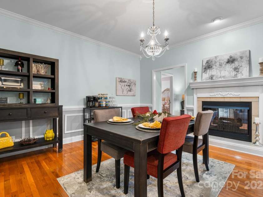 1246 Hillsboro Avenue, Hickory, NC 28602.  MLS# CAR4199854, YatesRealty ID 1745. Dining Room is open to Kitchen and has a view of the beautiful see through fireplace!