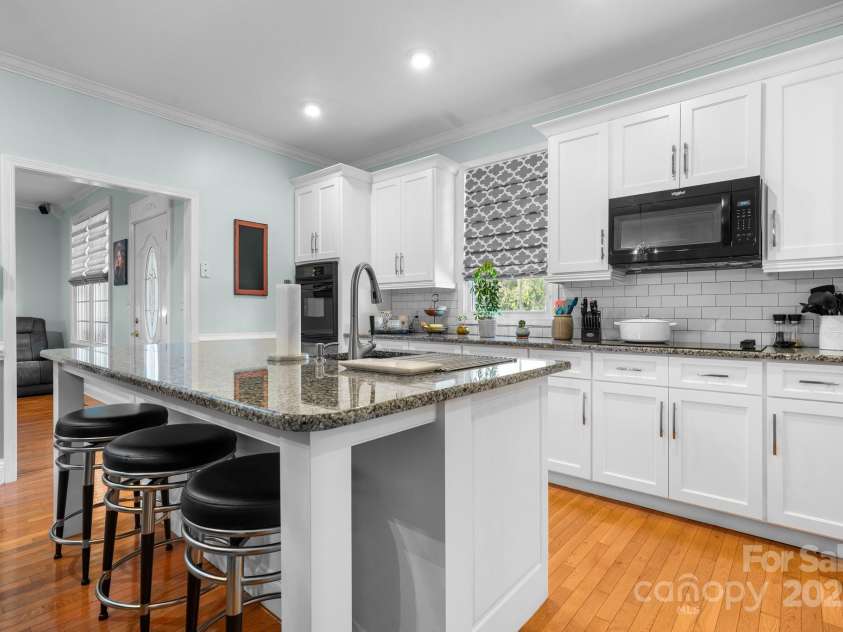 1246 Hillsboro Avenue, Hickory, NC 28602.  MLS# CAR4199854, YatesRealty ID 1745. Island with Eat at Bar