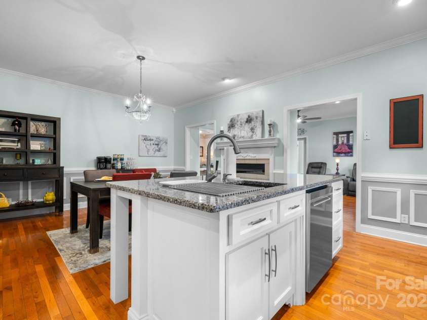 1246 Hillsboro Avenue, Hickory, NC 28602.  MLS# CAR4199854, YatesRealty ID 1745. Kitchen and dining room, hardwood floors.