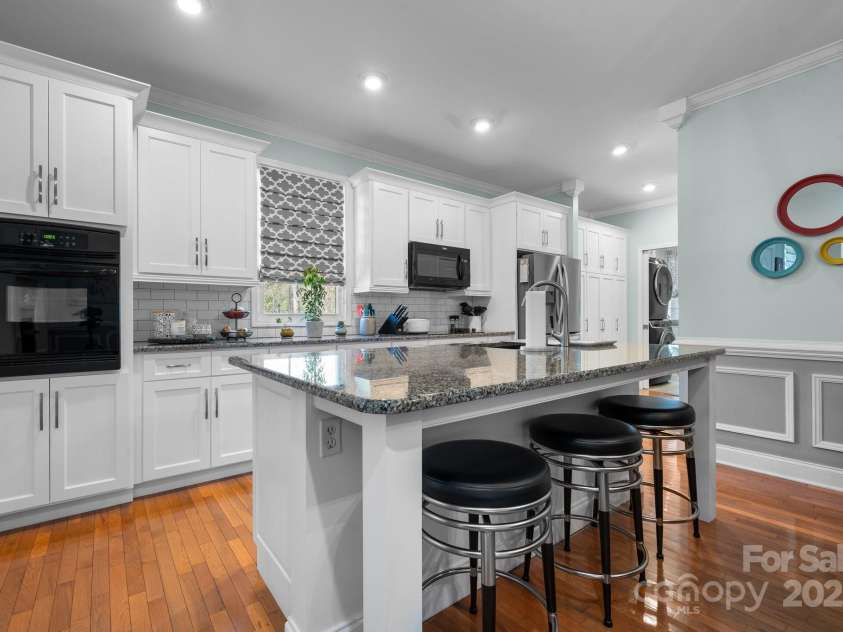 1246 Hillsboro Avenue, Hickory, NC 28602.  MLS# CAR4199854, YatesRealty ID 1745. Kitchen with Wall oven, and microwave over the stovetop to save all the space desired with prepping meals in your new kitchen!  Having a tone of space in your kitchen is nice, and this kitchen is VERY Nice and spacious 