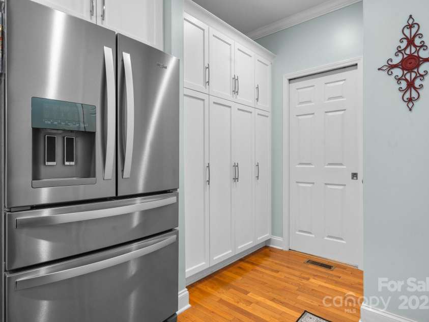 1246 Hillsboro Avenue, Hickory, NC 28602.  MLS# CAR4199854, YatesRealty ID 1745. Storage and access to laundry room off Kitchen.