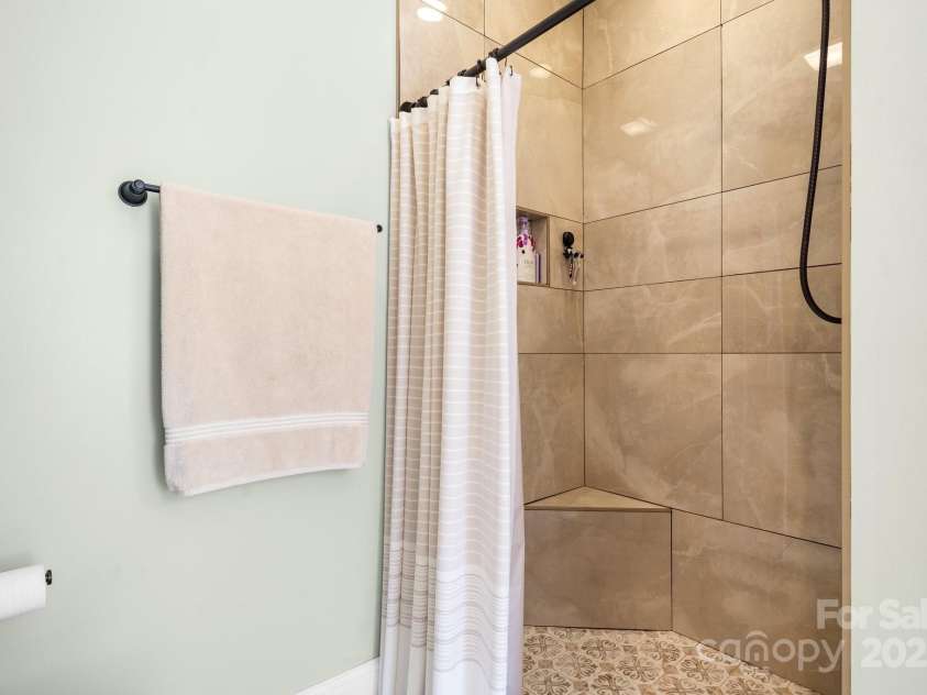 1246 Hillsboro Avenue, Hickory, NC 28602.  MLS# CAR4199854, YatesRealty ID 1745. Updated tile shower in the master bathroom!
