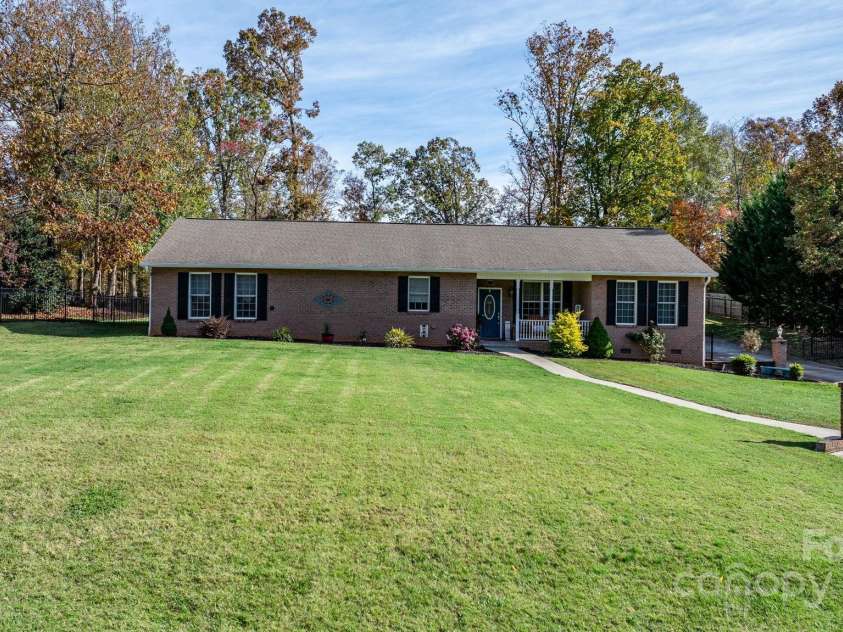 1246 Hillsboro Avenue, Hickory, NC 28602.  MLS# CAR4199854, YatesRealty ID 1745. Where else can you find a dream home, except Mountain View- Brick Ranch delight for me and hello garage lover for you!   Double attached garage w/ another detached brick garage that has 3 more bays!