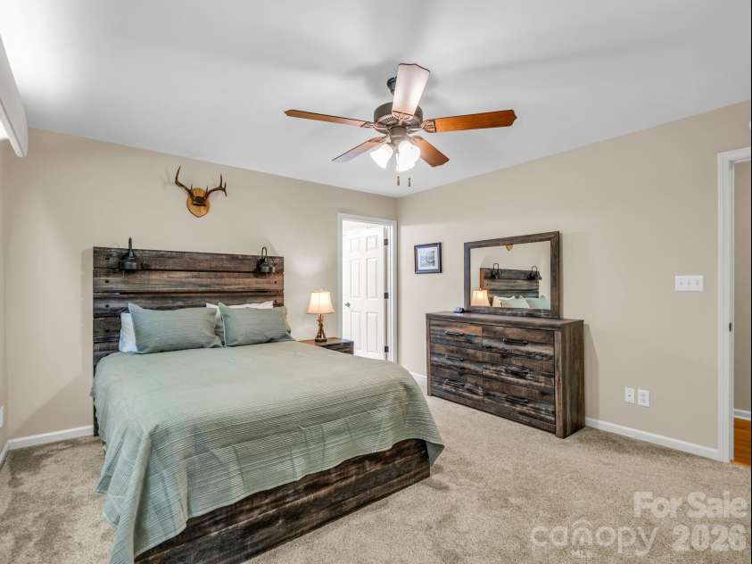 59 Agaliha Lane, Brevard, NC 28712.  MLS# CAR4392248, YatesRealty ID 1745. This bedroom has access to the second bathroom making it a easy second primary if needed.
