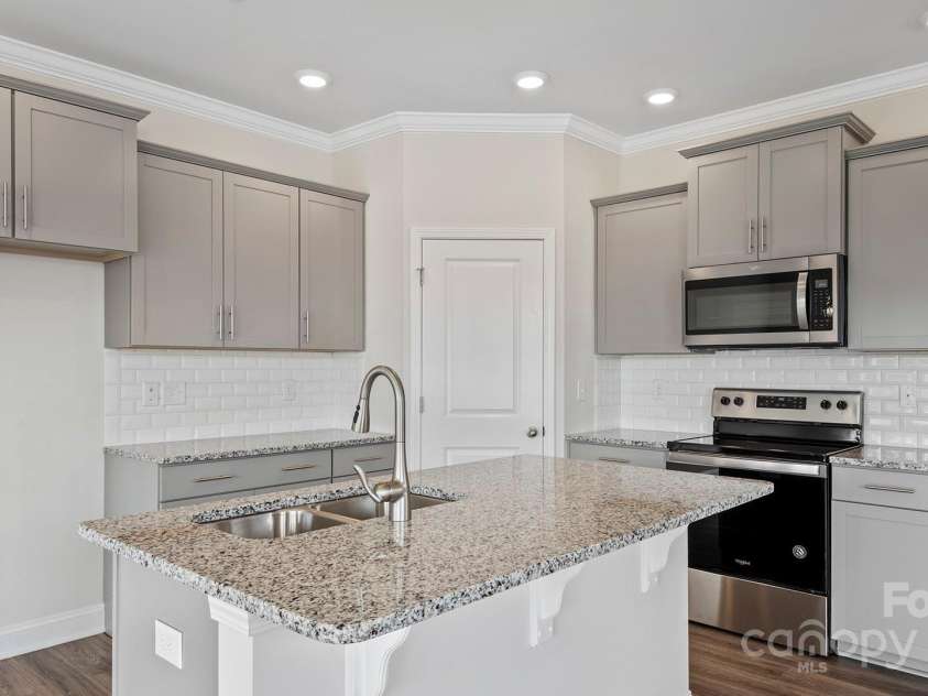 393 Lagoon Road, Fletcher, NC 28732.  MLS# CAR4260187, YatesRealty ID 17452. Photos are representative