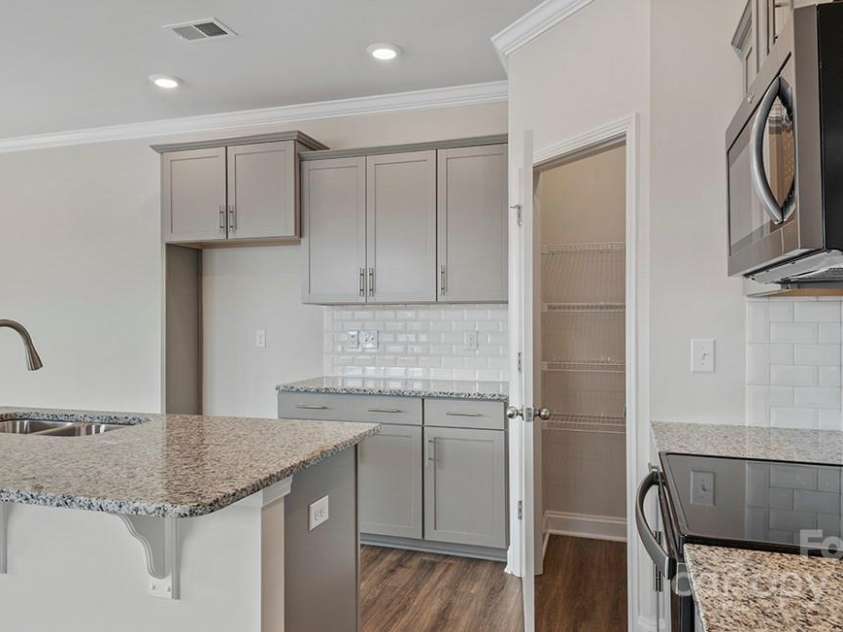 393 Lagoon Road, Fletcher, NC 28732.  MLS# CAR4260187, YatesRealty ID 17452. Photos are representative