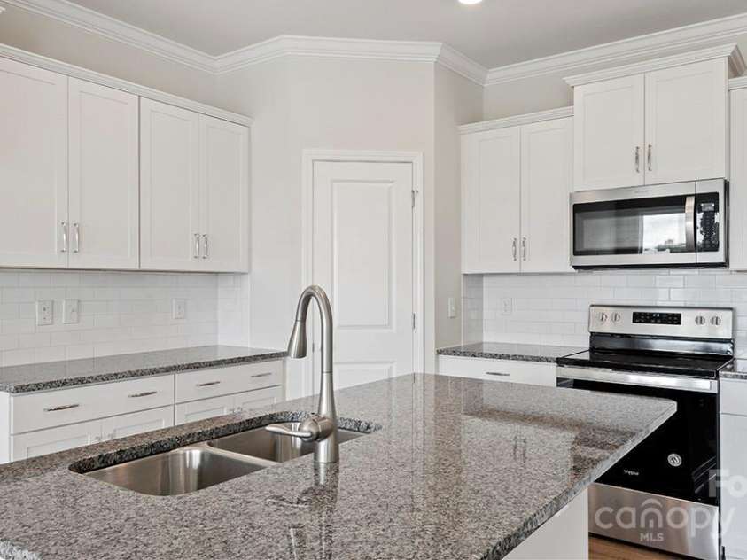 395 Lagoon Road, Fletcher, NC 28732.  MLS# CAR4260225, YatesRealty ID 17453. Photos are representative