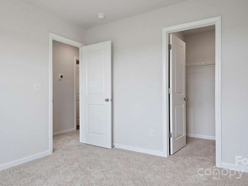 395 Lagoon Road, Fletcher, NC 28732.  MLS# CAR4260225, YatesRealty ID 17453. Photos are representative