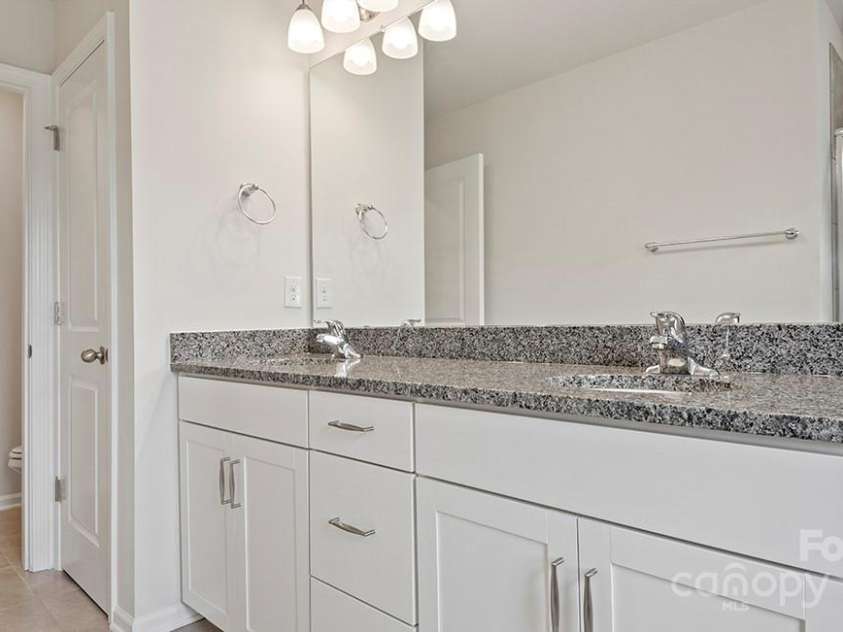395 Lagoon Road, Fletcher, NC 28732.  MLS# CAR4260225, YatesRealty ID 17453. Photos are representative
