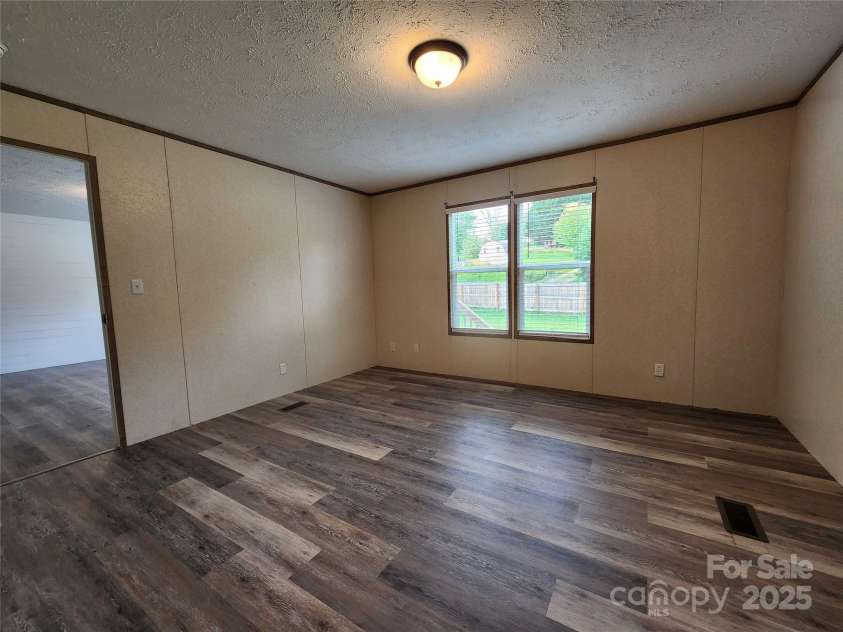 22 Ridge Top Acres Road, Candler, NC 28715.  MLS# CAR4265213, YatesRealty ID 17455. 