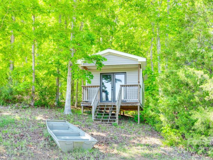 1780 Sierra Road, York, SC 29745.  MLS# CAR4252642, YatesRealty ID 17456. Boat House w/ hanging racks for kayaks & canoes