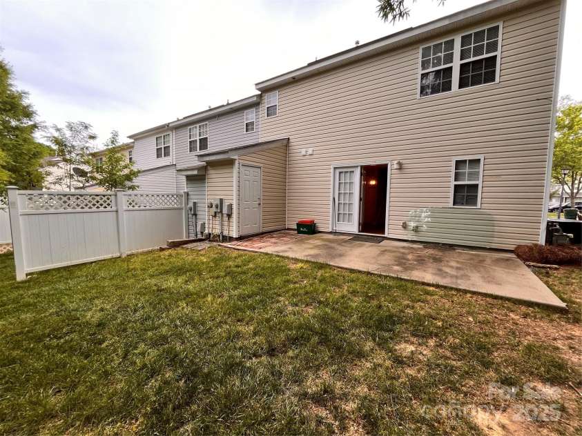 10875 Holly Ridge Boulevard, Charlotte, NC 28216.  MLS# CAR4135127, YatesRealty ID 17458. Back Patio