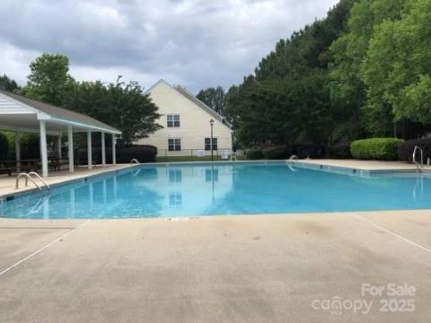 10875 Holly Ridge Boulevard, Charlotte, NC 28216.  MLS# CAR4135127, YatesRealty ID 17458. Community Pool