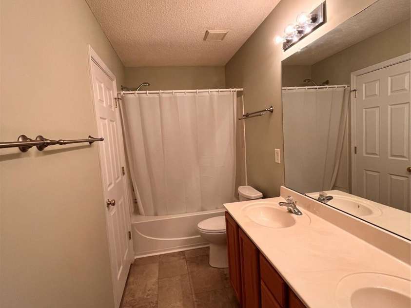 10875 Holly Ridge Boulevard, Charlotte, NC 28216.  MLS# CAR4135127, YatesRealty ID 17458. Primary bath