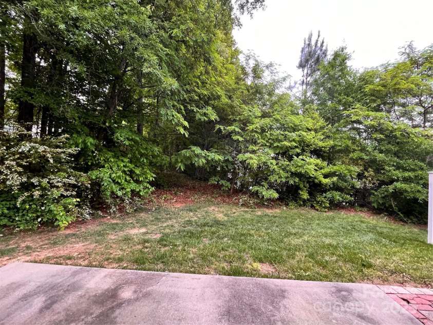 10875 Holly Ridge Boulevard, Charlotte, NC 28216.  MLS# CAR4135127, YatesRealty ID 17458. Private patio area