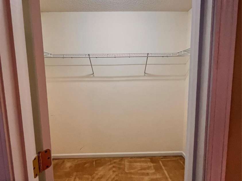 10875 Holly Ridge Boulevard, Charlotte, NC 28216.  MLS# CAR4135127, YatesRealty ID 17458. Walk-in closet