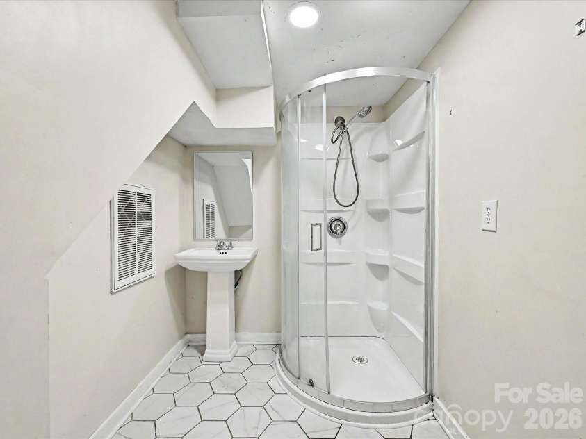 1123 Forest Hills School Road, Marshville, NC 28103.  MLS# CAR4377137, YatesRealty ID 17459. Basement Bathroom