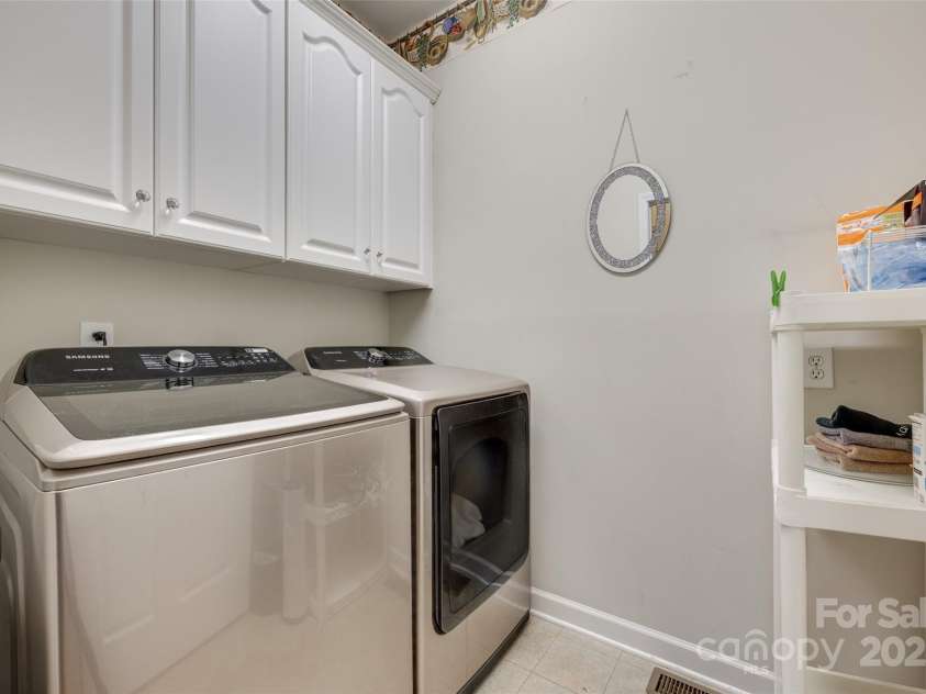 1305 Yellowood Court, Rock Hill, SC 29732.  MLS# CAR4258397, YatesRealty ID 17462. Laundry room with built in storage.