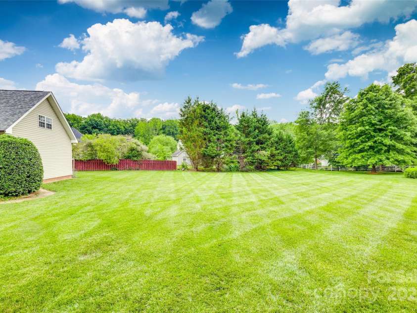 1305 Yellowood Court, Rock Hill, SC 29732.  MLS# CAR4258397, YatesRealty ID 17462. Spacious yard -