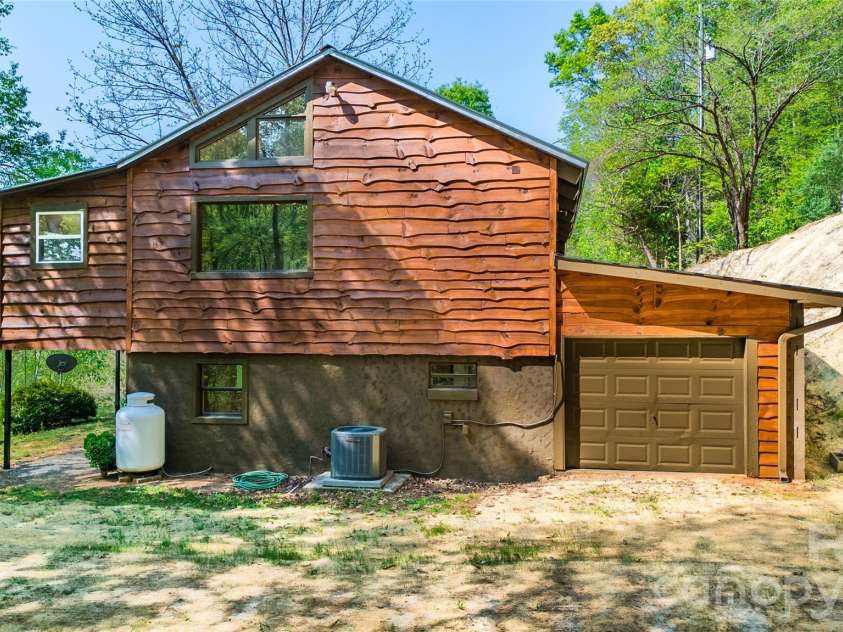 298 Timbuktu Road, Sylva, NC 28779.  MLS# CAR4374414, YatesRealty ID 17476. 