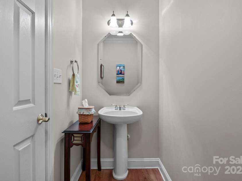 4563 Osprey Run Court, Denver, NC 28037.  MLS# CAR4250891, YatesRealty ID 17479. Downstairs powder room