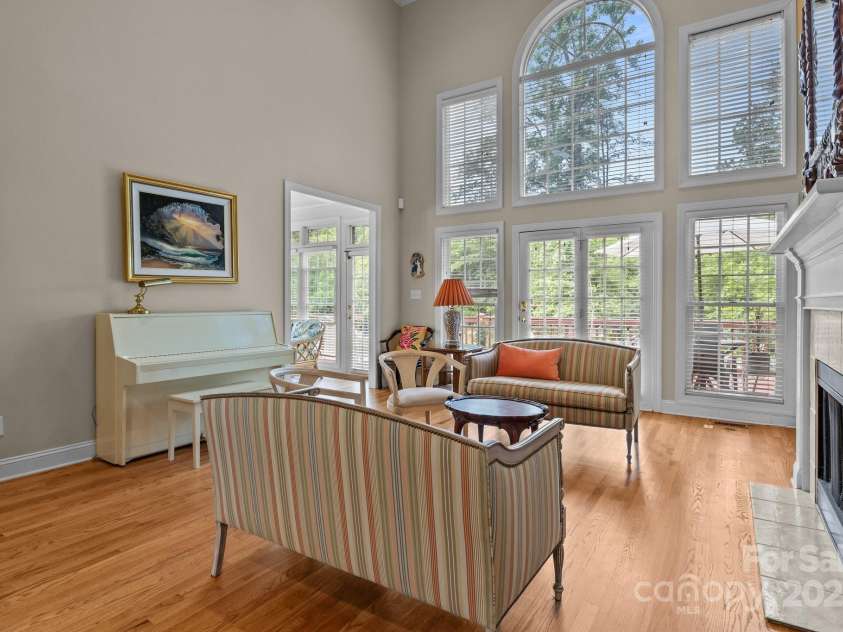 4563 Osprey Run Court, Denver, NC 28037.  MLS# CAR4250891, YatesRealty ID 17479. Great room with floor to ceiling windows