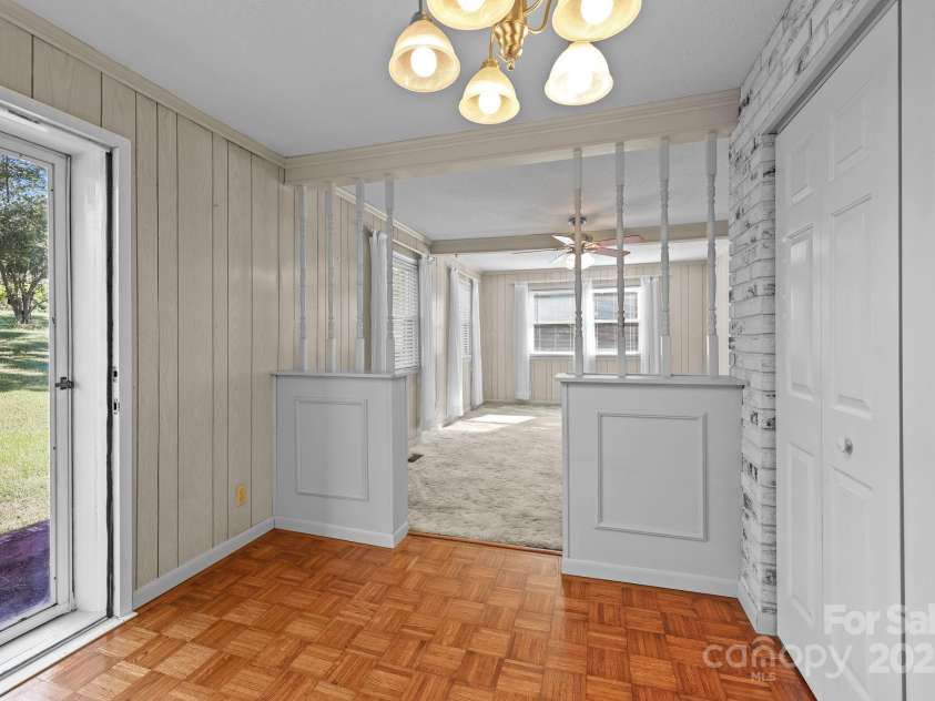 945 Alvin Hough Road, Midland, NC 28107.  MLS# CAR4309237, YatesRealty ID 1748. Foyer with double closets, parquet flooring and views of the family room. 