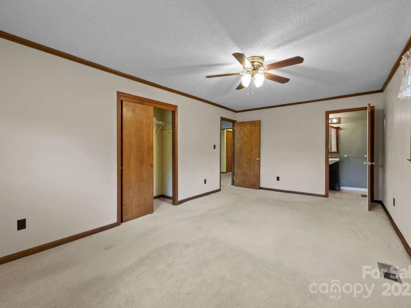 945 Alvin Hough Road, Midland, NC 28107.  MLS# CAR4309237, YatesRealty ID 1748. Primary Bedroom with ensuite bath