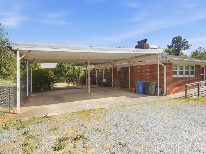 4108 Terry Terrace, Matthews, NC 28105.  MLS# CAR4363521, YatesRealty ID 17480. Back of Large Garage