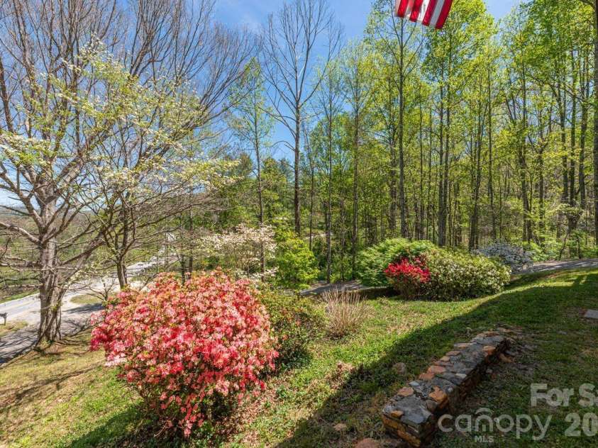 431 Pleasant Grove Road, Hendersonville, NC 28739.  MLS# CAR4368693, YatesRealty ID 17483. Landscaping Front elevation