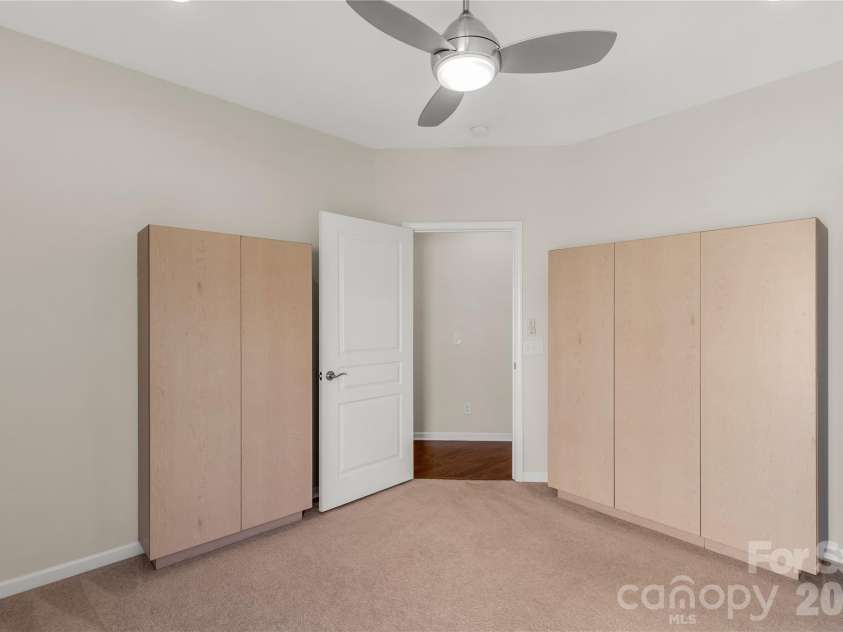 1079 Falling Leaf Street, Indian Land, SC 29707.  MLS# CAR4361772, YatesRealty ID 17485. Cabinets installed in bedroom 3 for storage or crafts