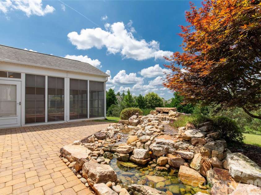 1079 Falling Leaf Street, Indian Land, SC 29707.  MLS# CAR4361772, YatesRealty ID 17485. Pond with 9 stage water flow
