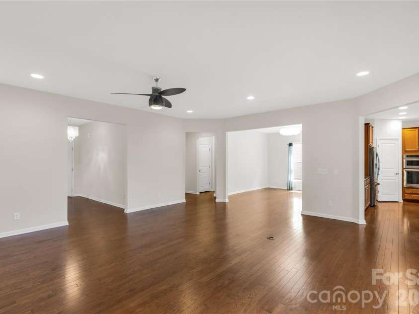 1079 Falling Leaf Street, Indian Land, SC 29707.  MLS# CAR4361772, YatesRealty ID 17485. View from great room into formal dining