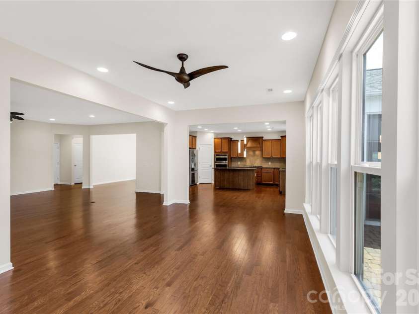 1079 Falling Leaf Street, Indian Land, SC 29707.  MLS# CAR4361772, YatesRealty ID 17485. View from sunroom into kitchen