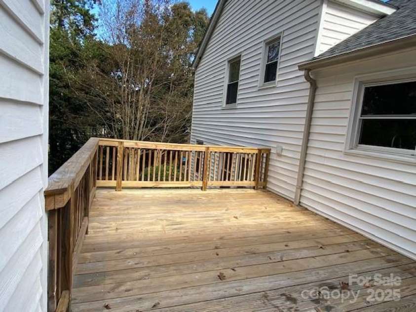 7608 Surreywood Place, Charlotte, NC 28270.  MLS# CAR4317171, YatesRealty ID 17485. Deck with wall to hang TV. Time to watch your favorite sport