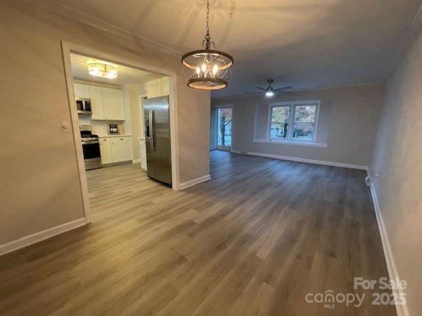 7608 Surreywood Place, Charlotte, NC 28270.  MLS# CAR4317171, YatesRealty ID 17485. Dining View into the Living Room