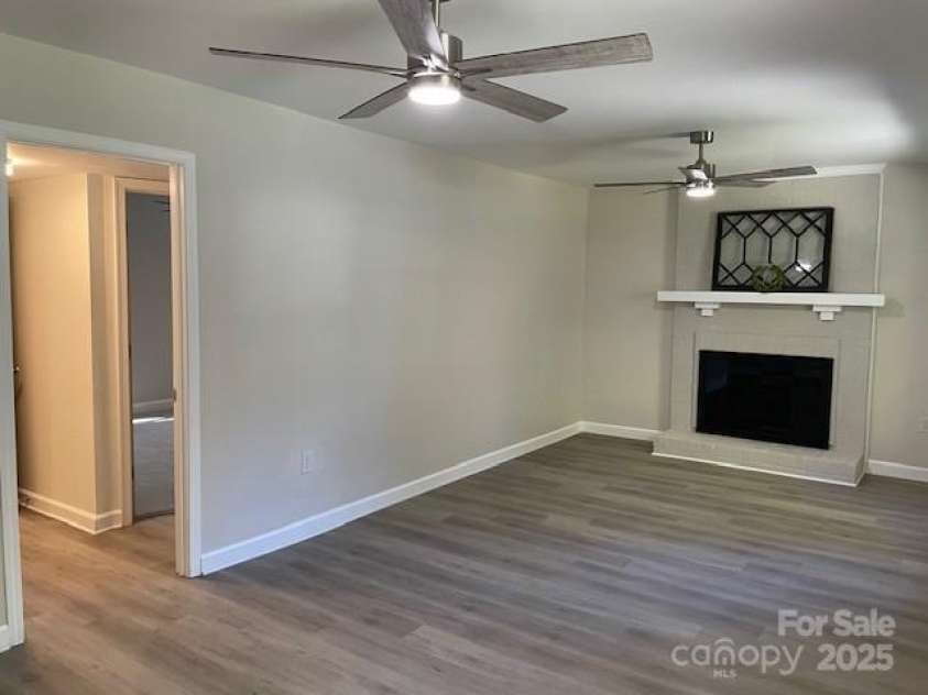 7608 Surreywood Place, Charlotte, NC 28270.  MLS# CAR4317171, YatesRealty ID 17485. Great Room, TV will look great over Fireplace