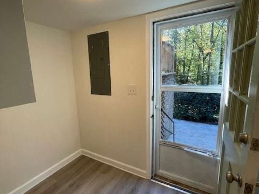 7608 Surreywood Place, Charlotte, NC 28270.  MLS# CAR4317171, YatesRealty ID 17485. Laundry with LVP