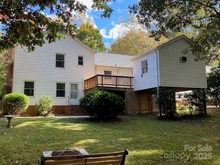 7608 Surreywood Place, Charlotte, NC 28270.  MLS# CAR4317171, YatesRealty ID 17485. Rear View of Home with view of deck and Flex Room