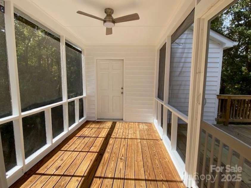 7608 Surreywood Place, Charlotte, NC 28270.  MLS# CAR4317171, YatesRealty ID 17485. Screen Porch with Fan and LED light